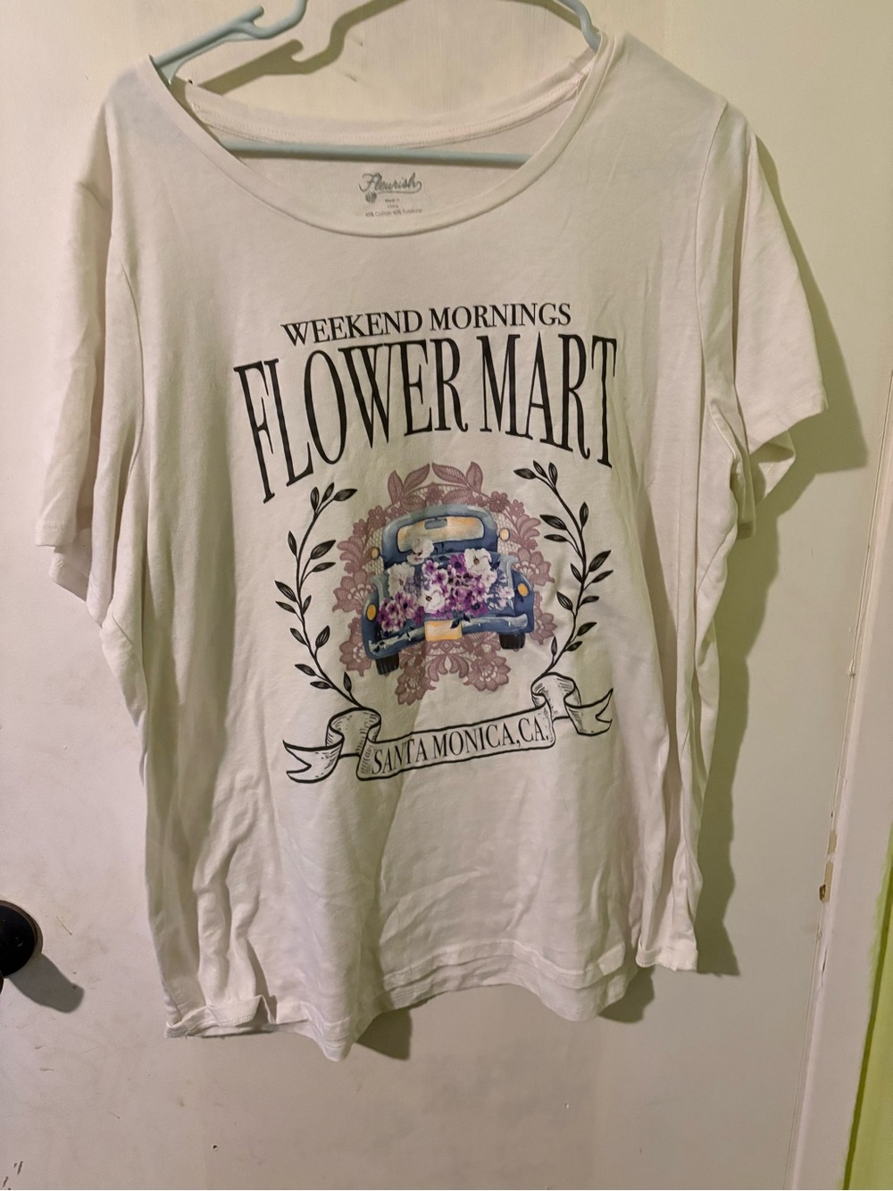 Fleurish White Graphic Tee with Blue Truck and Floral Design